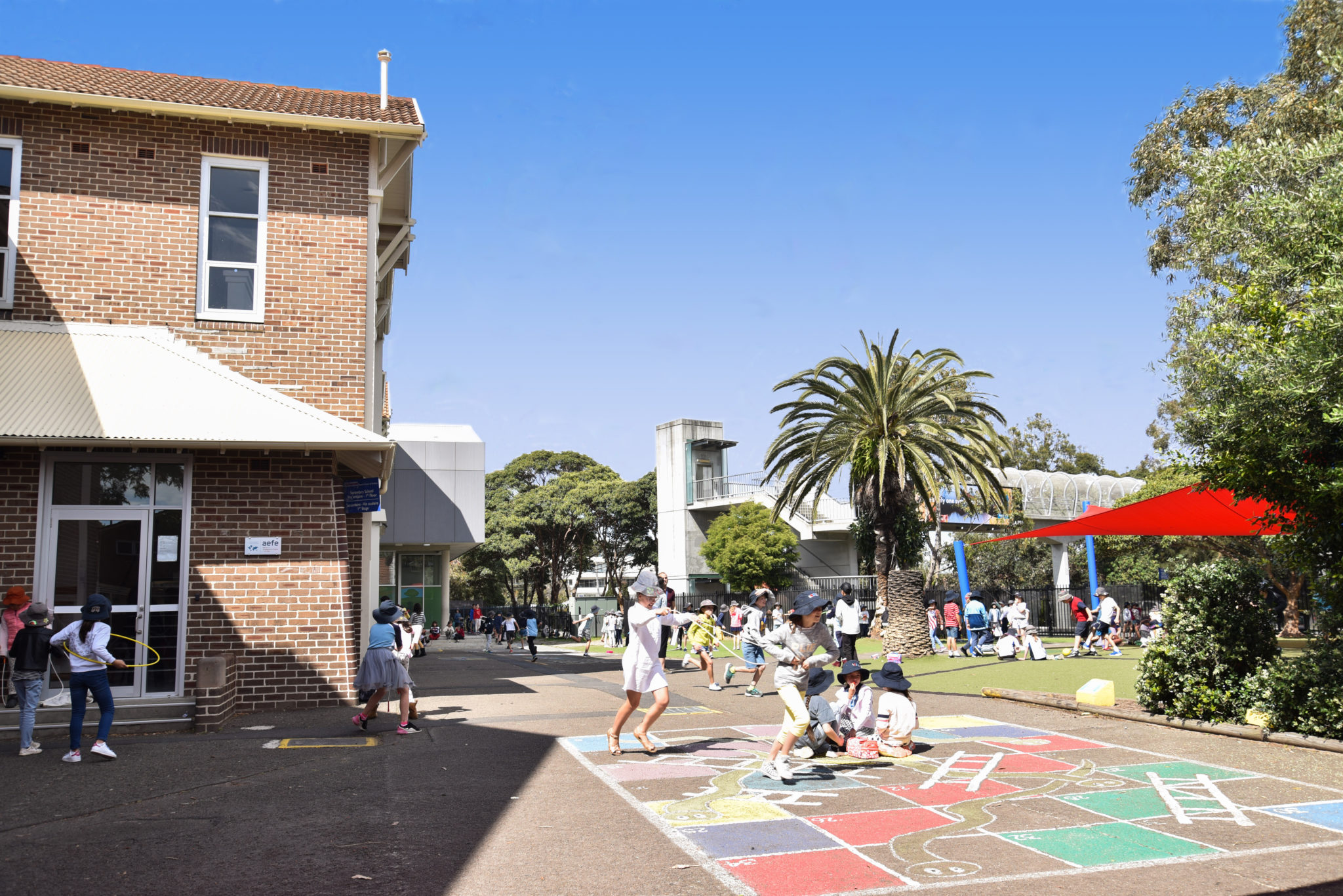 Students playing in a colourful playground