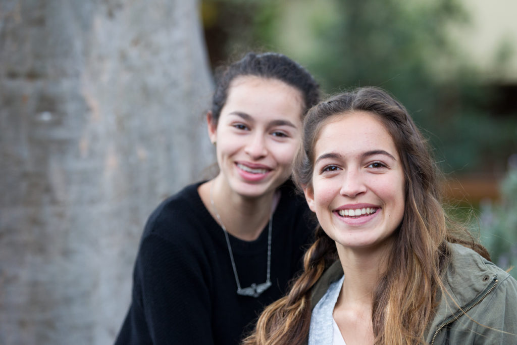 High school students smiling at the International French School of Sydney
