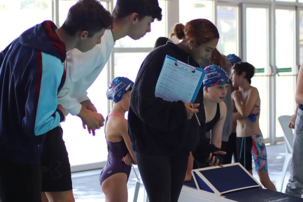 IB students at the International French School of Sydney help at the Asia-Pacific AEFE Swimming Championship
